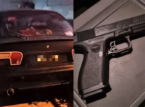 Man brandishes replica firearm at driver, passenger